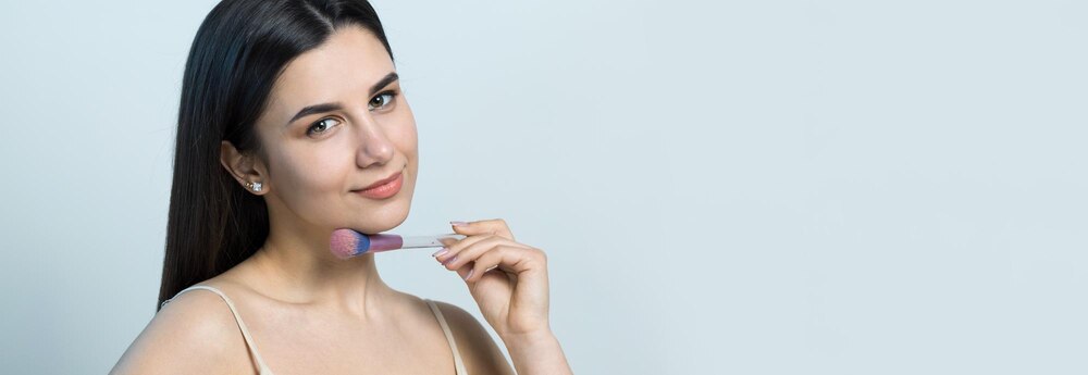 closeup-young-girl-light-top-white-background-making-facial-makeup_81340-8858.jpg