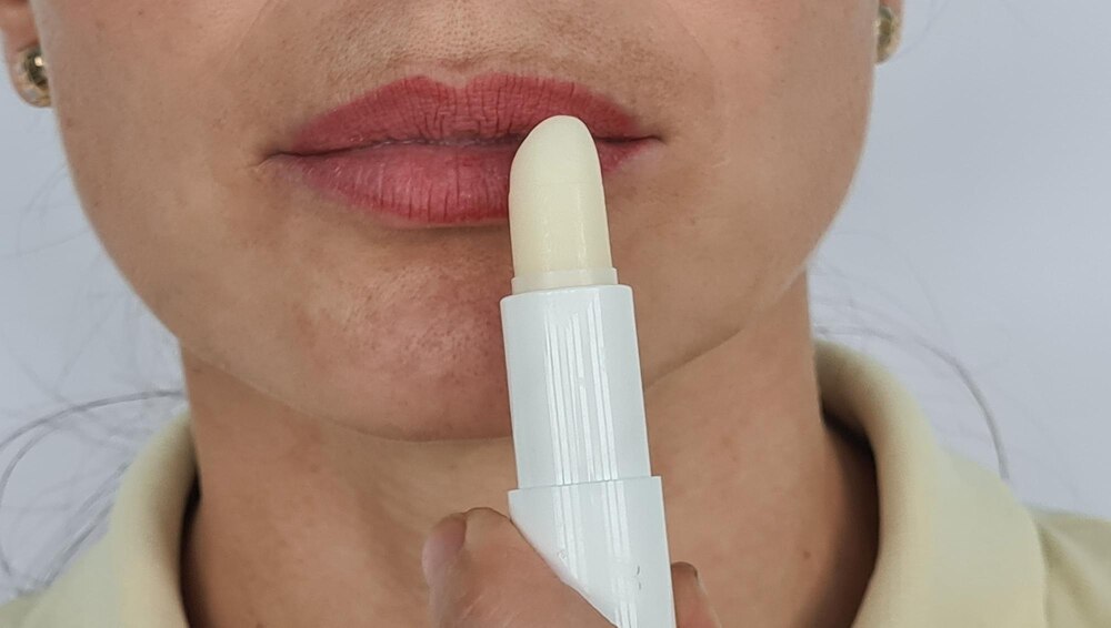 lip-skin-care-closeup-woman-face-applying-protective-lipstick_587895-3673.jpg